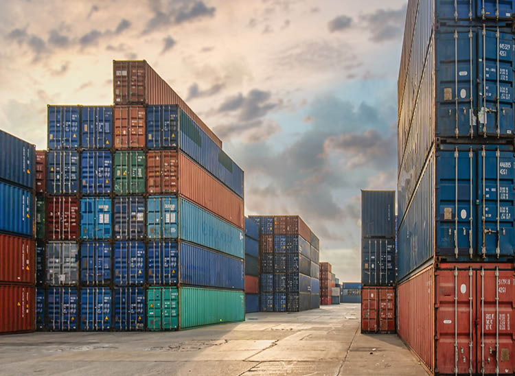 perspective view of containers at containers yard with forklift and truck