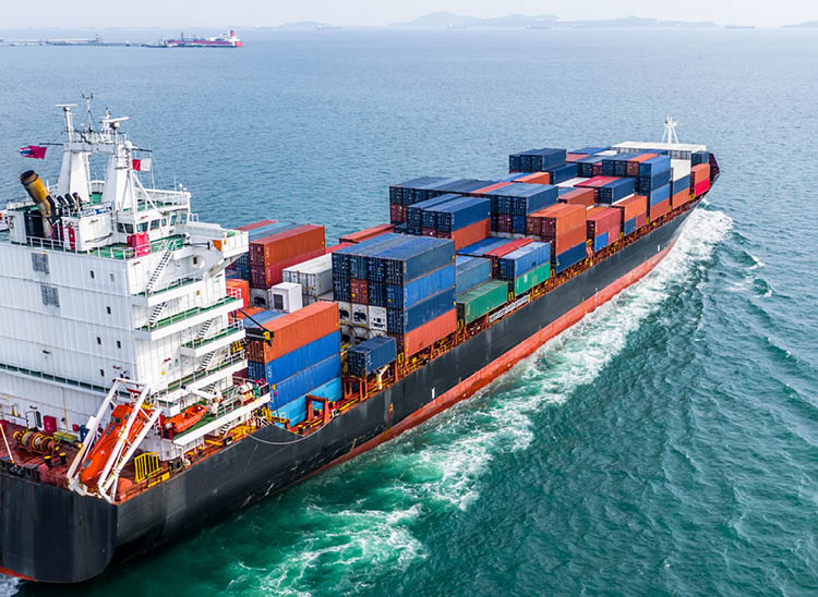 Aerial view cargo container ship sailing, container cargo ship in import export and business logistic and transportation of international by container ship in the open sea 